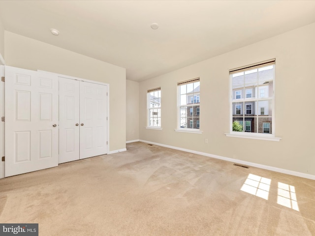 6207 Margarita Way, Frederick, MD 21703 - unfurnished bedroom with light colored carpet, baseboards, and a closet