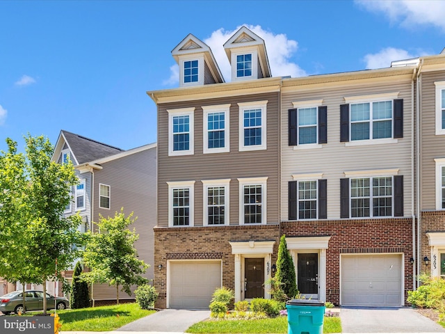 6207 Margarita Way, Frederick, MD 21703 - multi unit property with brick siding, a garage, and driveway