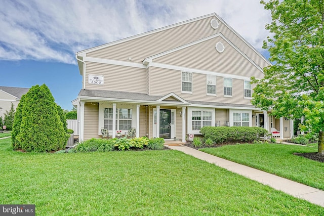 2501 Lexington Mews, Woolwich Twp, NJ 08085 - view of front of property with a front yard and covered porch