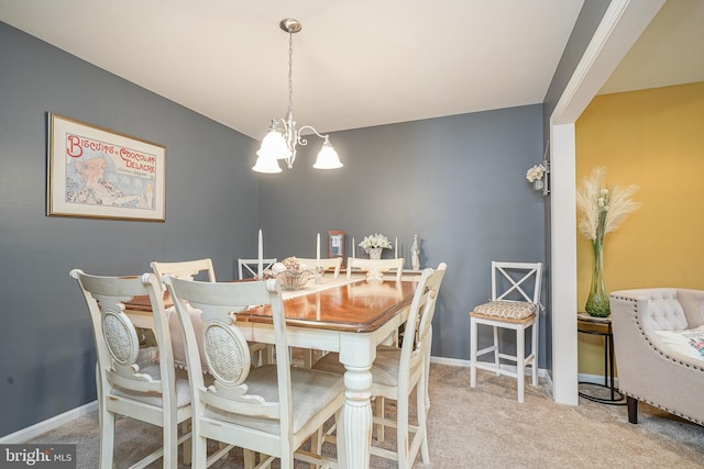 2501 Lexington Mews, Woolwich Twp, NJ 08085 - carpeted dining area featuring a chandelier and baseboards