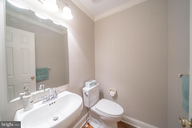 306 Springbrook Ct, Hockessin, DE 19707 - half bathroom with a sink, toilet, and crown molding