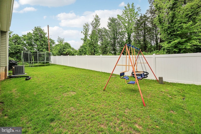 4202 Louisa Ave, Nottingham, MD 21236 - view of yard with a trampoline, central air condition unit, and a playground