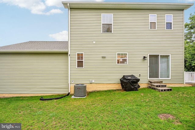 4202 Louisa Ave, Nottingham, MD 21236 - rear view of property with central AC unit, a yard, and entry steps