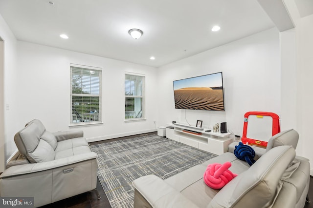 4202 Louisa Ave, Nottingham, MD 21236 - living area featuring dark wood-style flooring, recessed lighting, and baseboards