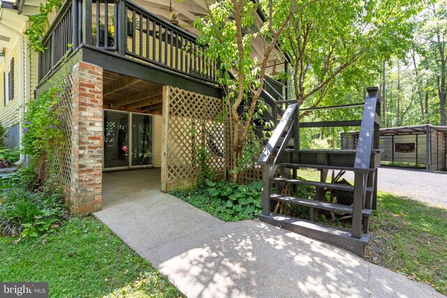 141 Meadows Rd, Fredericksburg, VA 22406 - exterior space with driveway, stairway, and a wooden deck