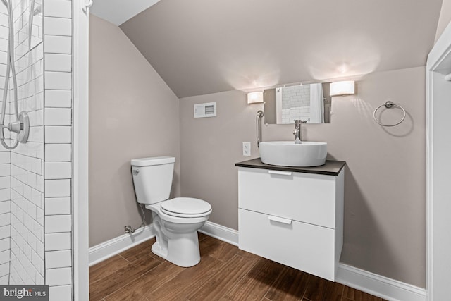 3082 Limekiln Pike, Glenside, PA 19038 - bathroom featuring toilet, wood finished floors, vanity, baseboards, and lofted ceiling