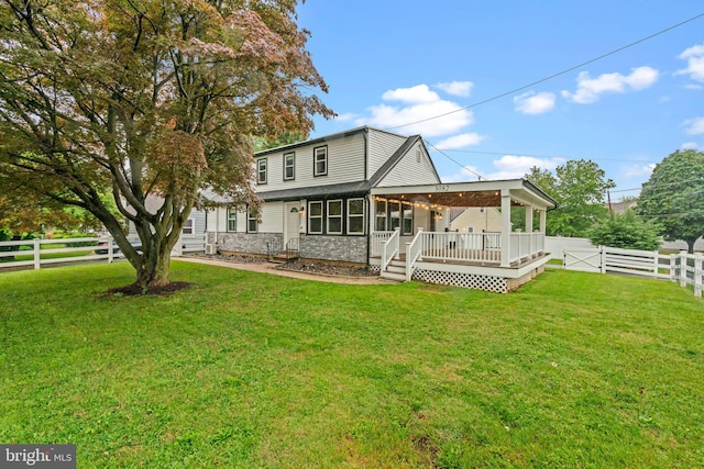 3082 Limekiln Pike, Glenside, PA 19038 - back of property featuring a wooden deck, a gate, and a sunroom