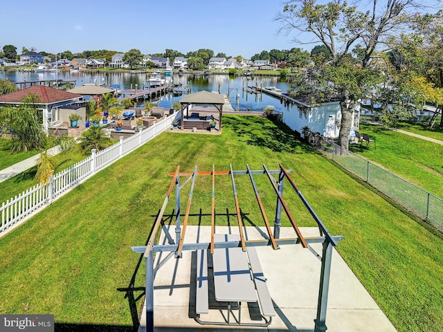 view of property's community with a gazebo and a water view