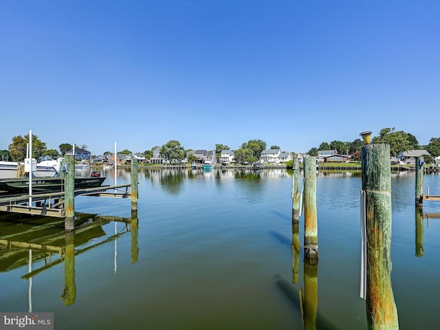 dock area featuring a water view