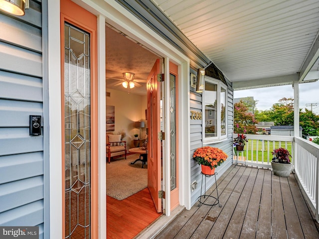 wooden terrace with covered porch
