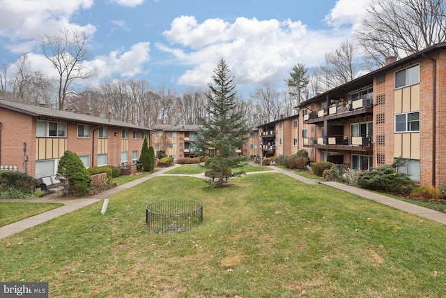 10167 Fair Woods Dr Unit 310, Fairfax, VA 22030 - surrounding community with a yard and a residential view