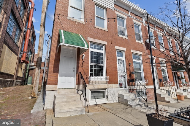 2514 Ashland Ave, Baltimore, MD 21205 - view of front of house with brick siding and entry steps