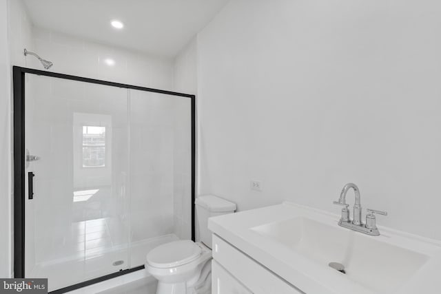 2514 Ashland Ave, Baltimore, MD 21205 - full bathroom with a stall shower, toilet, and vanity