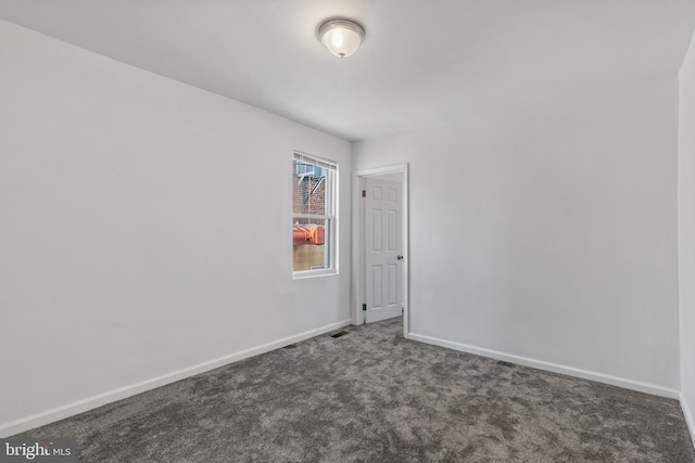 2514 Ashland Ave, Baltimore, MD 21205 - carpeted empty room featuring baseboards