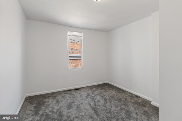 2514 Ashland Ave, Baltimore, MD 21205 - spare room featuring carpet floors and baseboards