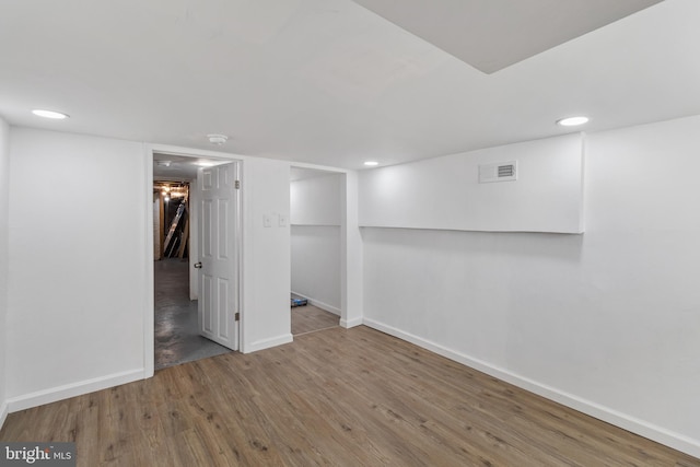 2514 Ashland Ave, Baltimore, MD 21205 - finished basement featuring baseboards, wood finished floors, and recessed lighting