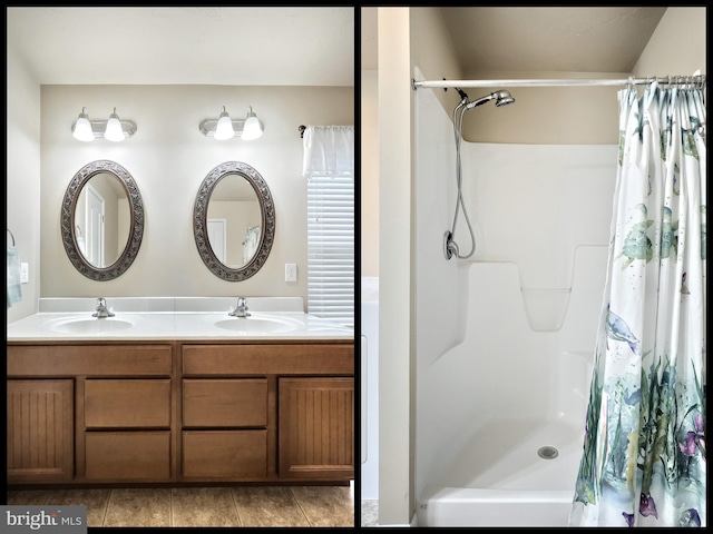 200 Sonny St, Hanover, PA 17331 - bathroom featuring a shower with shower curtain, double vanity, and tile patterned flooring