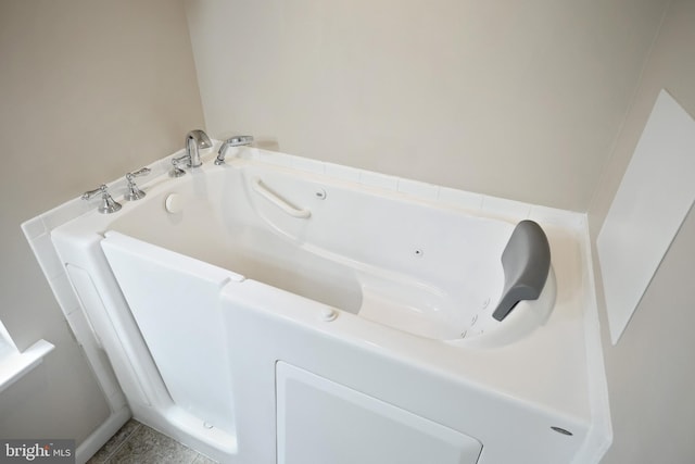 200 Sonny St, Hanover, PA 17331 - bathroom featuring a tub with jets and tile patterned floors