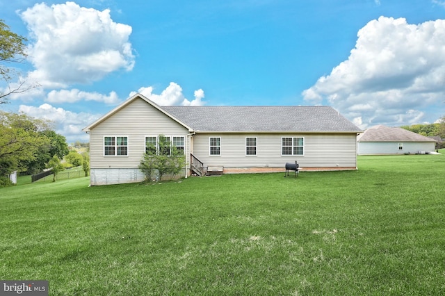 200 Sonny St, Hanover, PA 17331 - back of house with a yard and roof with shingles