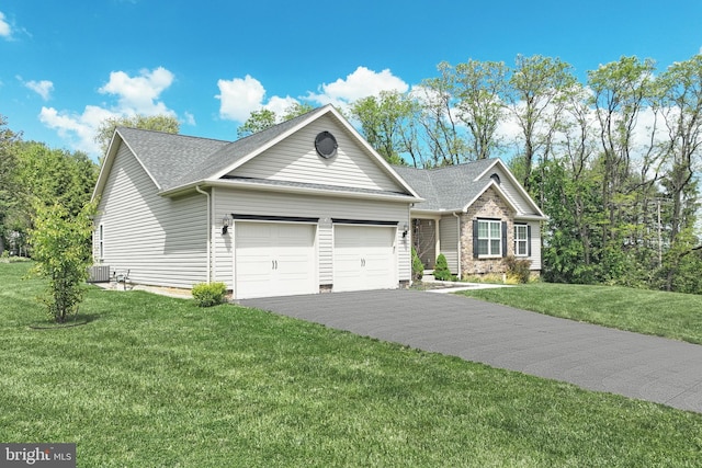 200 Sonny St, Hanover, PA 17331 - view of front facade featuring an attached garage, a front lawn, asphalt driveway, and roof with shingles