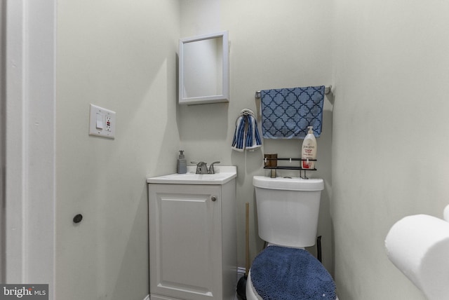 2458 N Natrona St, Philadelphia, PA 19132 - half bath featuring toilet, vanity, and baseboards