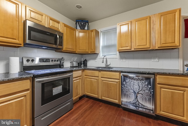 2458 N Natrona St, Philadelphia, PA 19132 - kitchen featuring appliances with stainless steel finishes, a sink, beverage cooler, dark wood-style flooring, and decorative backsplash