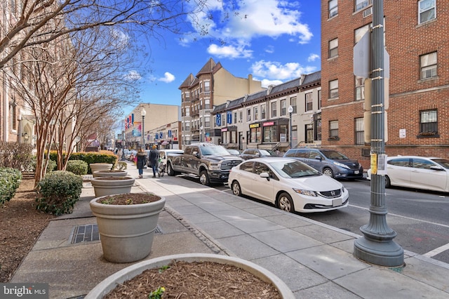 view of parking / parking lot featuring a residential view