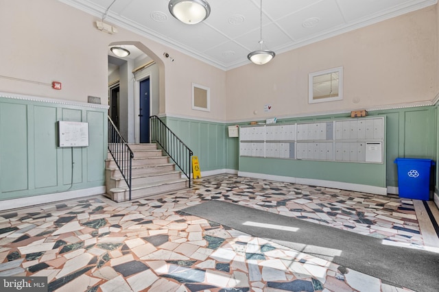 community lobby with a wainscoted wall and a decorative wall