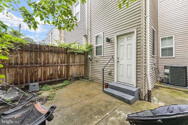 2460 N Natrona St, Philadelphia, PA 19132 - entrance to property featuring central AC and a patio
