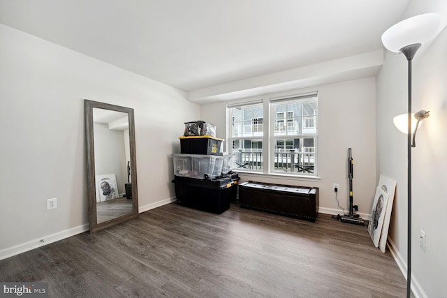 office space with wood finished floors and baseboards