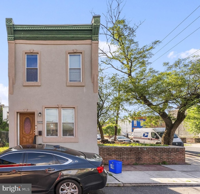2466 N Natrona St, Philadelphia, PA 19132 - view of front of home featuring stucco siding