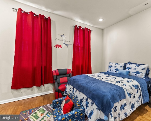 2466 N Natrona St, Philadelphia, PA 19132 - bedroom with wood finished floors, recessed lighting, and baseboards