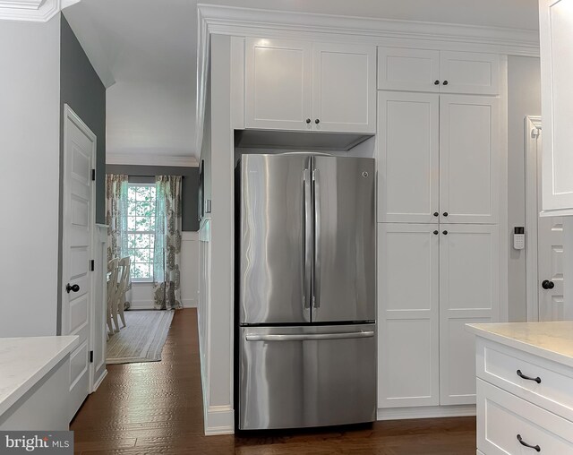 11372 Wollaston, Swan Point, MD 20645 - kitchen with freestanding refrigerator, white cabinets, dark wood-style floors, and ornamental molding