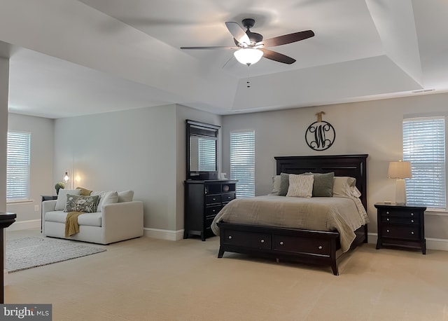 11372 Wollaston, Swan Point, MD 20645 - bedroom featuring light carpet, baseboards, a raised ceiling, and ceiling fan