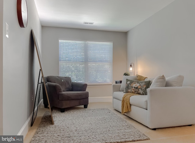 11372 Wollaston, Swan Point, MD 20645 - living area featuring light colored carpet and baseboards