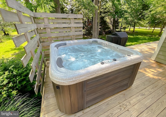 11372 Wollaston, Swan Point, MD 20645 - wooden deck featuring a hot tub and a lawn