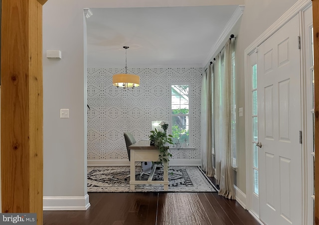 11372 Wollaston, Swan Point, MD 20645 - foyer entrance featuring baseboards, crown molding, wood finished floors, wallpapered walls, and an accent wall