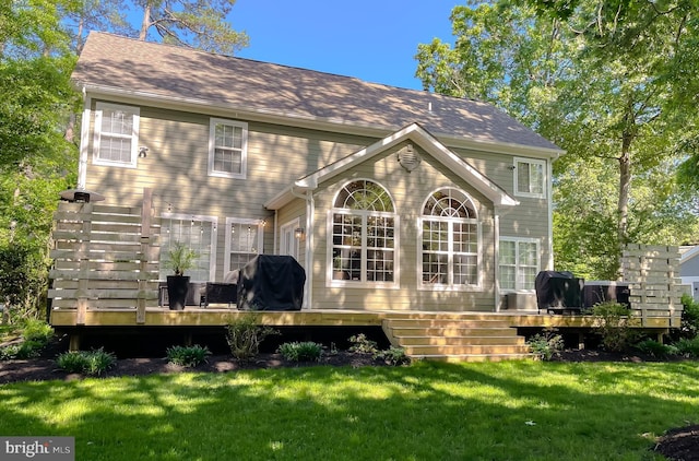 11372 Wollaston, Swan Point, MD 20645 - rear view of house with a lawn and a wooden deck