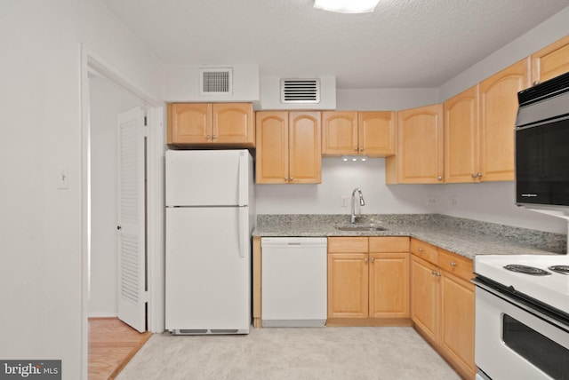 1800 Old Meadow Rd Unit 1218, Mclean, VA 22102 - kitchen featuring white appliances, light brown cabinetry, and light stone counters