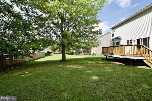 view of yard featuring a deck