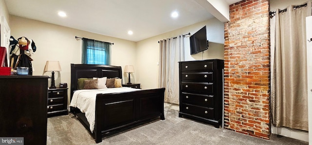 bedroom featuring light colored carpet and recessed lighting