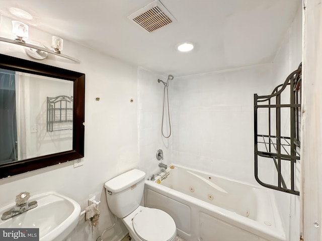 full bathroom featuring a sink, toilet, a combined bath / shower with jetted tub, and recessed lighting