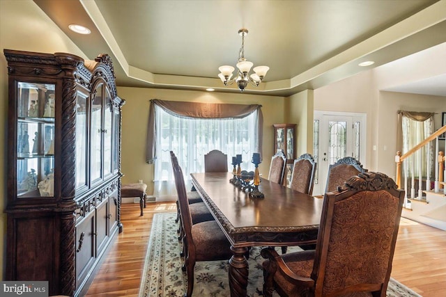304 Iron Valley Dr, Lebanon, PA 17042 - dining space featuring a chandelier, stairway, healthy amount of natural light, light wood-type flooring, and recessed lighting
