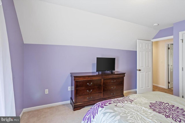 304 Iron Valley Dr, Lebanon, PA 17042 - bedroom with light colored carpet, vaulted ceiling, and baseboards