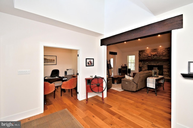 130 Schultz Rd, Sellersville, PA 18960 - living area featuring light wood-type flooring, beamed ceiling, an office area, and baseboards