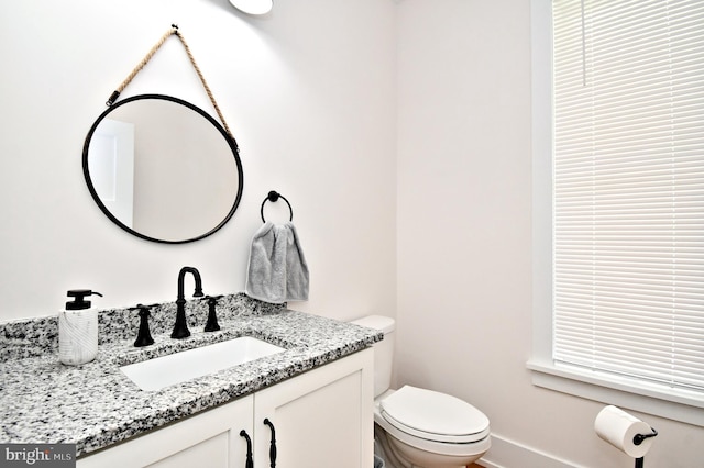 130 Schultz Rd, Sellersville, PA 18960 - bathroom with toilet, vanity, and baseboards