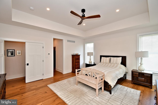 130 Schultz Rd, Sellersville, PA 18960 - bedroom with light wood finished floors, baseboards, a raised ceiling, recessed lighting, and ceiling fan