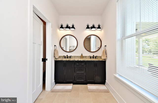 130 Schultz Rd, Sellersville, PA 18960 - bathroom featuring tile patterned flooring, baseboards, and double vanity