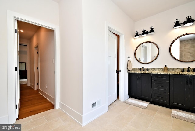 130 Schultz Rd, Sellersville, PA 18960 - full bath with tile patterned floors, baseboards, and double vanity