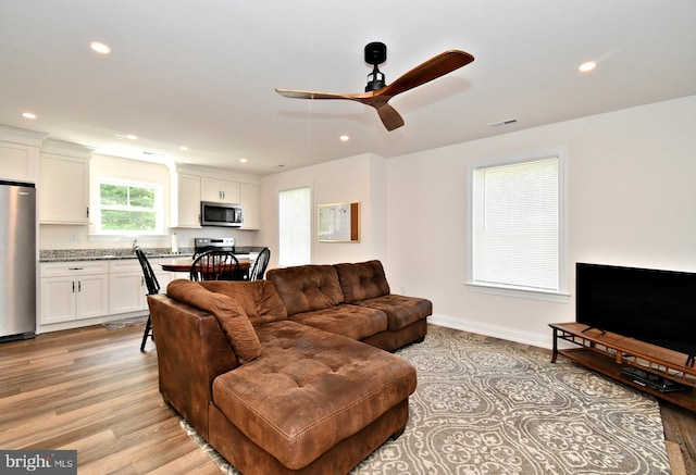 130 Schultz Rd, Sellersville, PA 18960 - living room with light wood finished floors, ceiling fan, recessed lighting, and baseboards